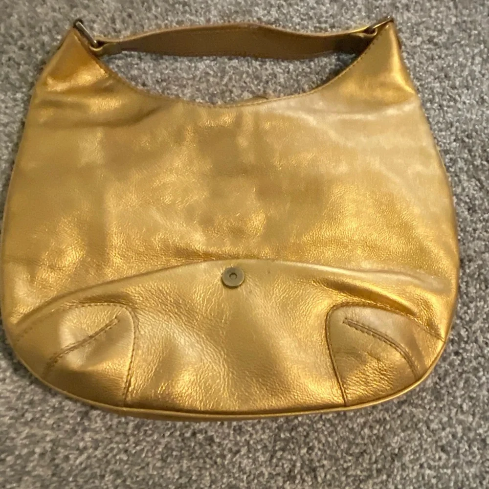Michael Kors Gold hobo purse